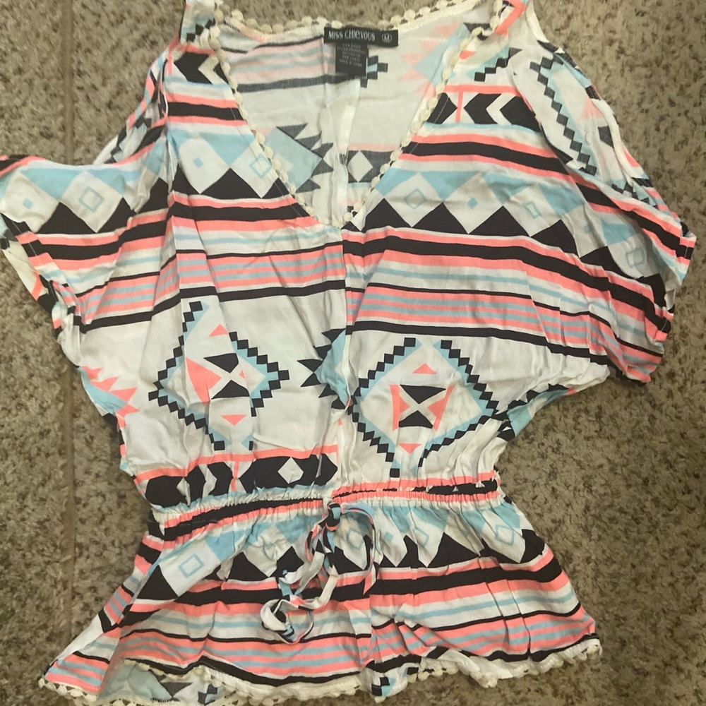 Cute shirt. Worn a couple times just needs ironed
